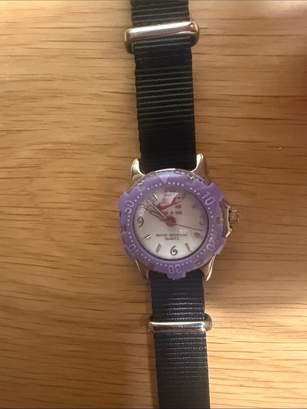 Rare Nike Purple Bezel Sport Watch with Black Strap, Made in USA, dial is xs.